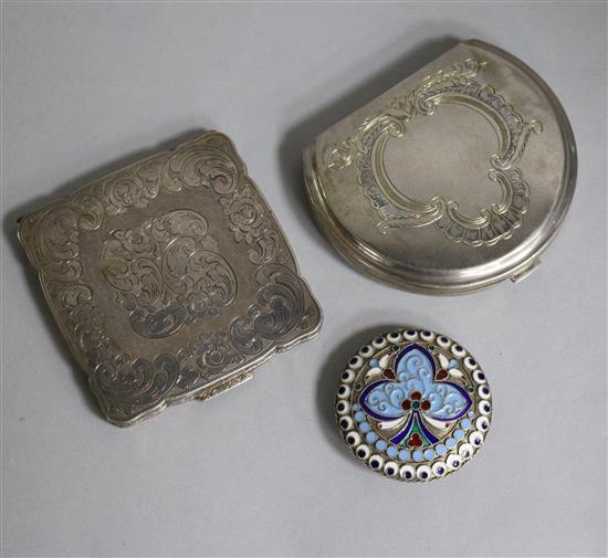A Russian style enamelled white metal compact and two other compacts